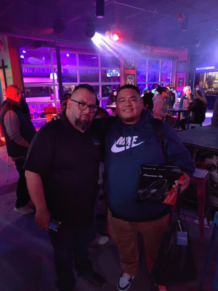 DJ John Styles at venue with Pioneer DJ headphones